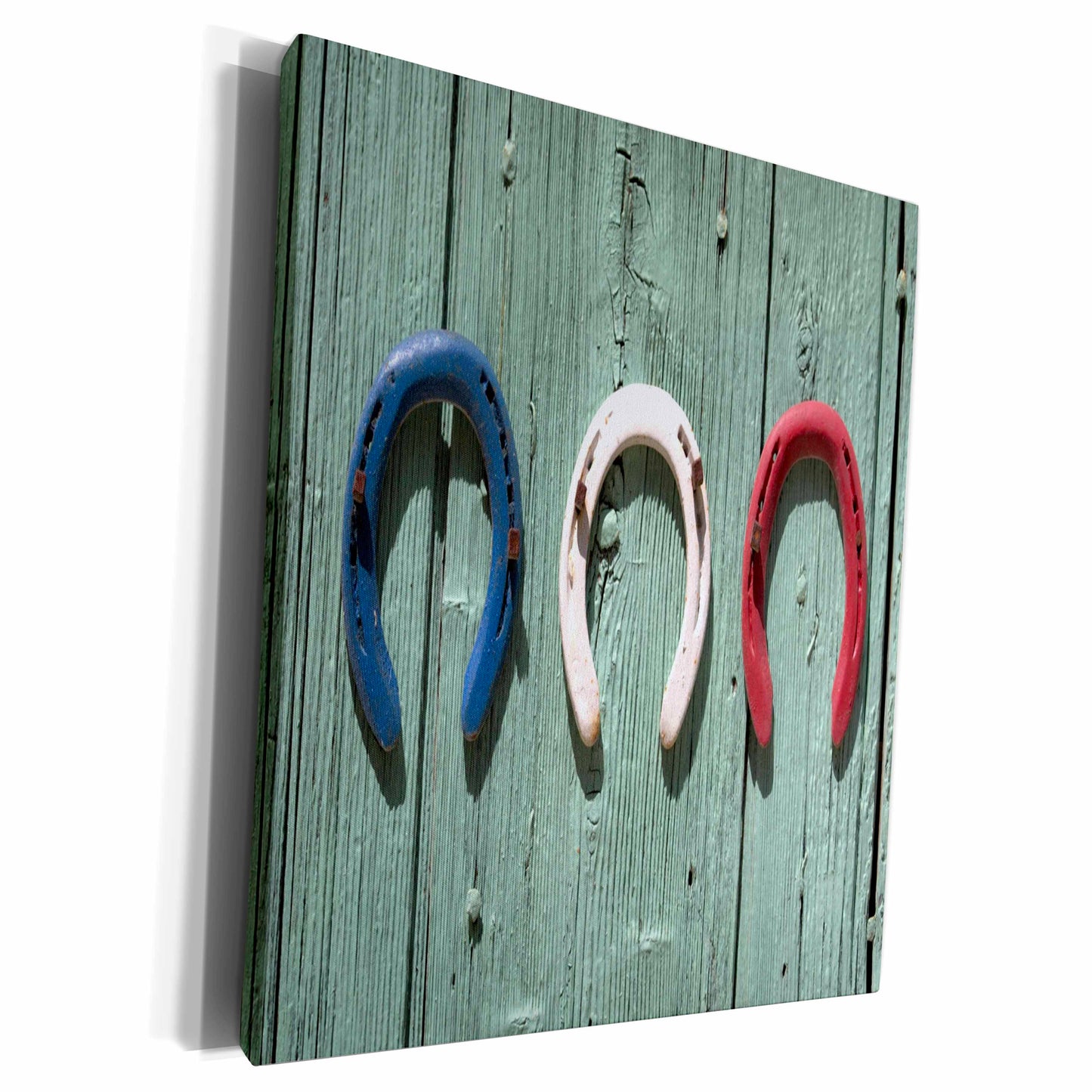 3dRose Image of Red White and Blue Horse Shoes On Barn Wood - Museum Grade Canvas Wrap (cw_264393)